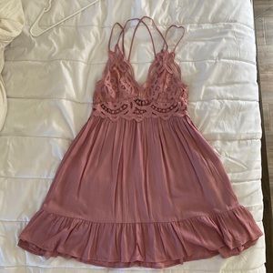 Pink Dress with lace top. Crisscross back. With adjustable straps.